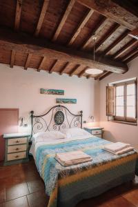 Postel nebo postele na pokoji v ubytování Agriturismo Casavecchia
