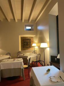 Postel nebo postele na pokoji v ubytování LEAR • Dining Club
