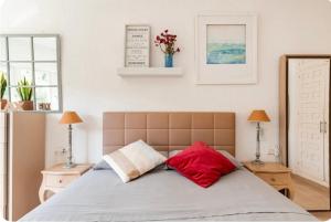 Łóżko lub łóżka w pokoju w obiekcie Residencial Algaida