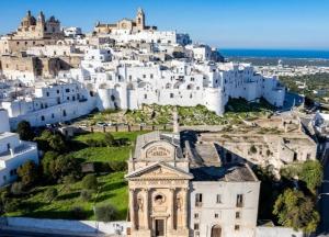 an aerial view of a city with white buildings at Casa Mirabilis 44 in Ostuni