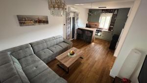 a living room with a couch and a table at Sea Level in Kotor +81 photos