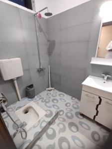 Koupelna v ubytování Bless Inn Residency