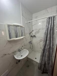 Koupelna v ubytování Apartment Varnica