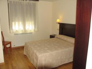 Postel nebo postele na pokoji v ubytování Villa Russell Hotel&Apartments