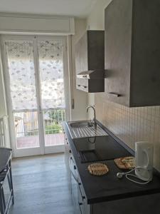 Kuchyň nebo kuchyňský kout v ubytování Apartment in Chiavenna