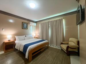 Postel nebo postele na pokoji v ubytování Apart Hotel Hamilton