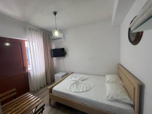Ένα ή περισσότερα κρεβάτια σε δωμάτιο στο Room Click inn