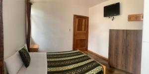 Et tv og/eller underholdning på Hotel Chasky Cuenca + 21 billeder