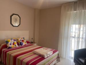 Postel nebo postele na pokoji v ubytování APCOSTAS - Torre del Mar Playa - MALAGA + 26 fotografií