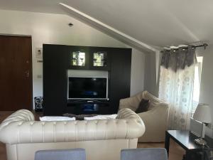 TV/trung tâm giải trí tại Home sweet home