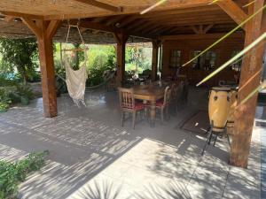Patio nebo venkovní prostory v ubytování River Heart Lodges