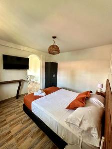 Cama ou camas em um quarto em Eco-Hotel Palma É Coco