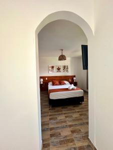 Cama ou camas em um quarto em Eco-Hotel Palma É Coco