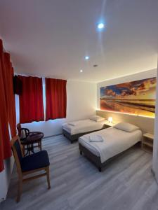 Posteľ alebo postele v izbe v ubytovaní Stilo Hotel