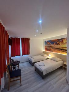 Posteľ alebo postele v izbe v ubytovaní Stilo Hotel
