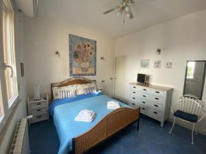 En eller flere senge i et værelse på Gioia con vista SoleMare + 50 billeder