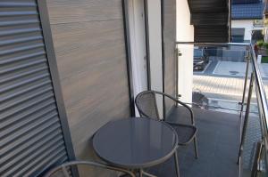 Balkón alebo terasa v ubytovaní Apartament Mushellka - Dziwnówek Horizon Park , 2 sypialnie i salon