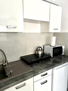 Kuchyňa alebo kuchynka v ubytovaní Apartament Wygodny S2