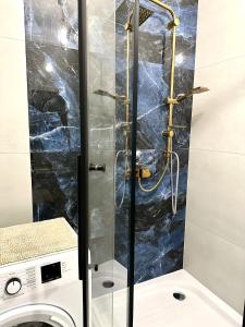 Kúpeľňa v ubytovaní Apartament Wygodny S2 + 17 fotografií