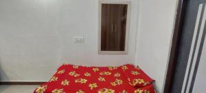 Ένα ή περισσότερα κρεβάτια σε δωμάτιο στο Royal Bliss Homestay