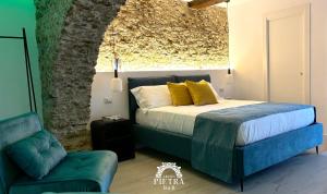Postel nebo postele na pokoji v ubytování Arco di Pietra B&B