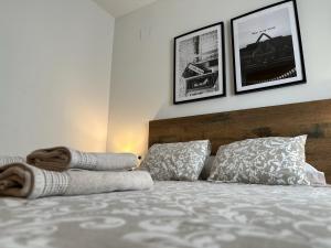 Posteľ alebo postele v izbe v ubytovaní Apartamentos Vernia 4-15