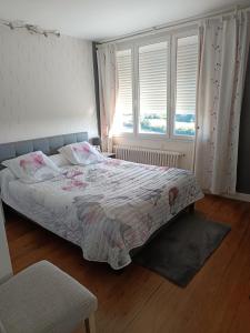 Posteľ alebo postele v izbe v ubytovaní Bellevue