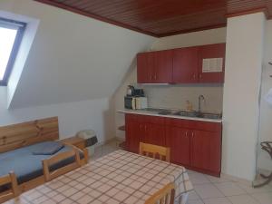 Kuchyň nebo kuchyňský kout v ubytování Apartman116 Airport
