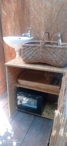 a bathroom counter with a sink and a microwave at Le MER lodge in Vallauris +21 photos