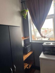 Kuchyň nebo kuchyňský kout v ubytování Double en suit room in Levenshulme