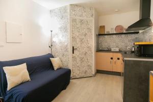 Kuchyň nebo kuchyňský kout v ubytování Le Bellamy - T2 Cosy et paisible + 4 fotografie