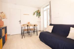 Posezení v ubytování Le Bellamy - T2 Cosy et paisible