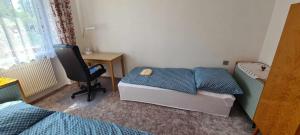 Postel nebo postele na pokoji v ubytování Apartmány Zelená Hora s velkou zahradou