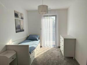 Ένα ή περισσότερα κρεβάτια σε δωμάτιο στο Indigo Home +6 φωτογραφίες
