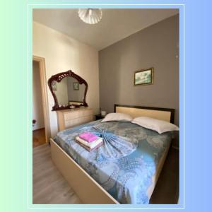 Postel nebo postele na pokoji v ubytování NEO Apartments