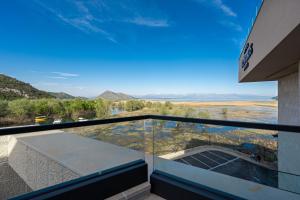 a view from the balcony of a house at Hotel De‘Andros Virpazar in Virpazar