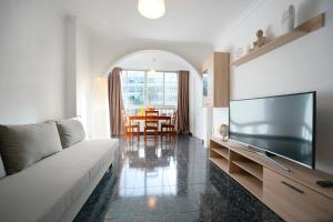 TV a/nebo společenská místnost v ubytování La Casa de la Playa