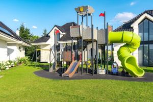 Herní místnost nebo prostor pro děti v ubytování Family Resort Ustka - Domki dwupoziomowe z basenem