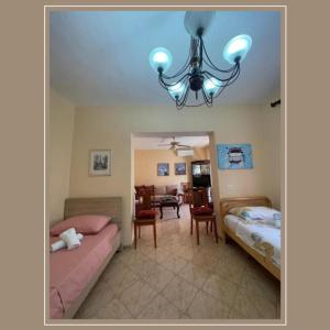 Postel nebo postele na pokoji v ubytování NEO Apartments