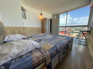 Voodi või voodid majutusasutuse PENTHOUSE 10 MIN port croisière et aéroport toas
