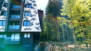 an aerial view of a building with trees at Oaza in Sarajevo