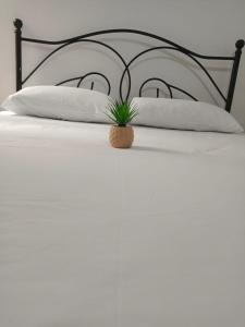 Postel nebo postele na pokoji v ubytování rose apartment