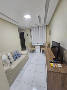 TV a/nebo společenská místnost v ubytování Apartamento no Inácio Barbosa