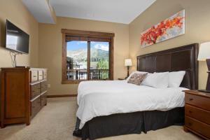 Ένα ή περισσότερα κρεβάτια σε δωμάτιο στο Air Conditioning, Penthouse Condo1-Bedroom Plus Den