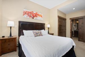 Ένα ή περισσότερα κρεβάτια σε δωμάτιο στο Air Conditioning, Penthouse Condo1-Bedroom Plus Den