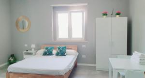 Posteľ alebo postele v izbe v ubytovaní Diamond Suite Fiumicino Casa vacanze
