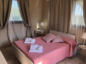 Letto o letti in una camera di Borgo Nocchiara