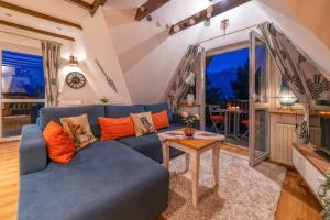 Posezení v ubytování Apartament Chateau Karpielówka Kościelisko