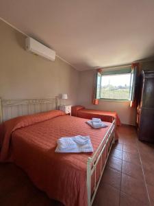 Letto o letti in una camera di Borgo Nocchiara