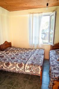 Postel nebo postele na pokoji v ubytování Guest house Bee